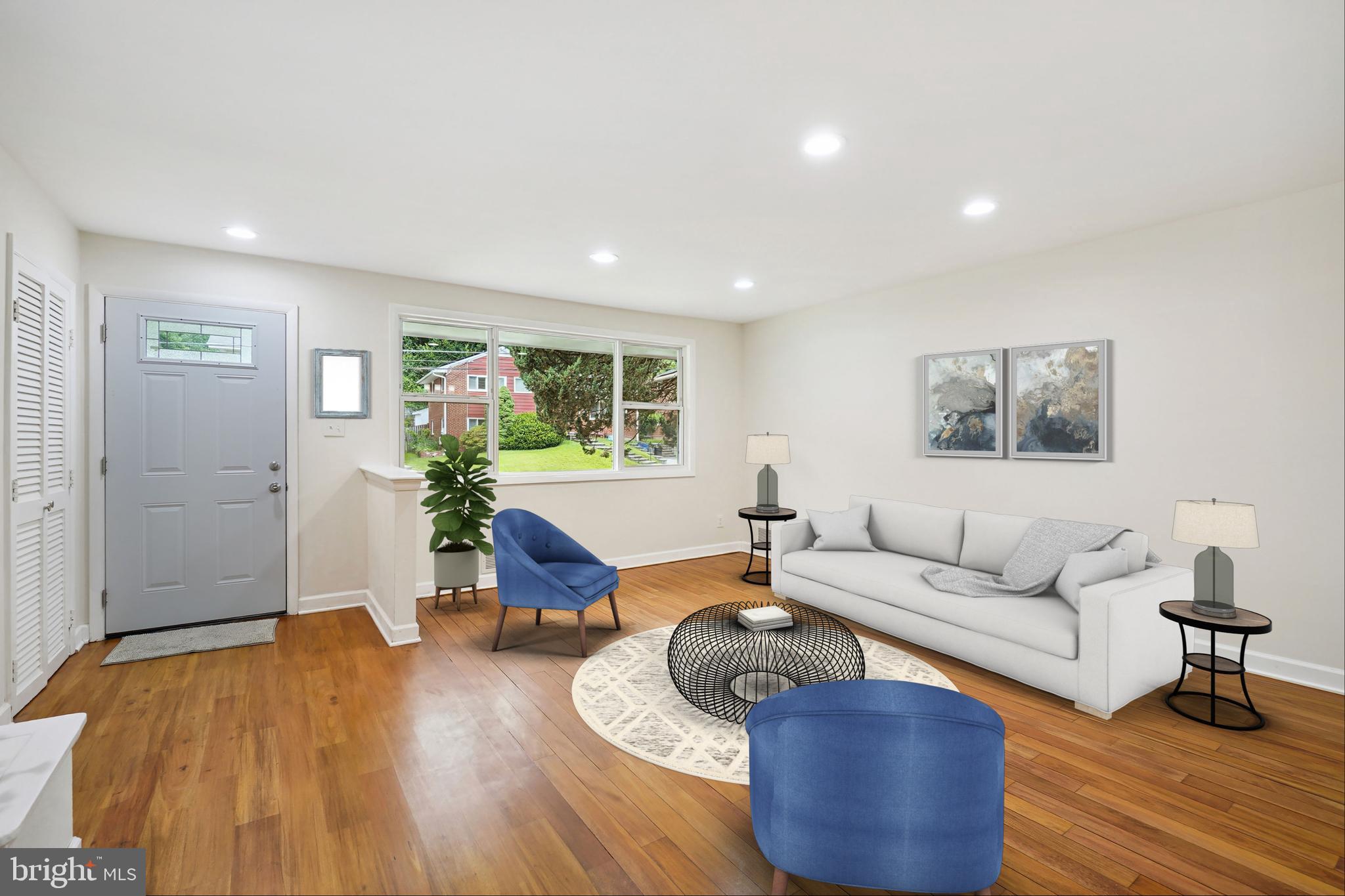10307 Leslie Street Silver Spring, MD 20902 - Photo 5 of 46 a living room with furniture and a wooden floor