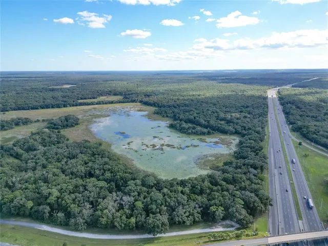 a view of a yard with an outdoor space