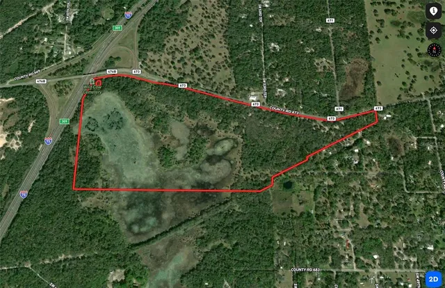 a black and white photo of a living room