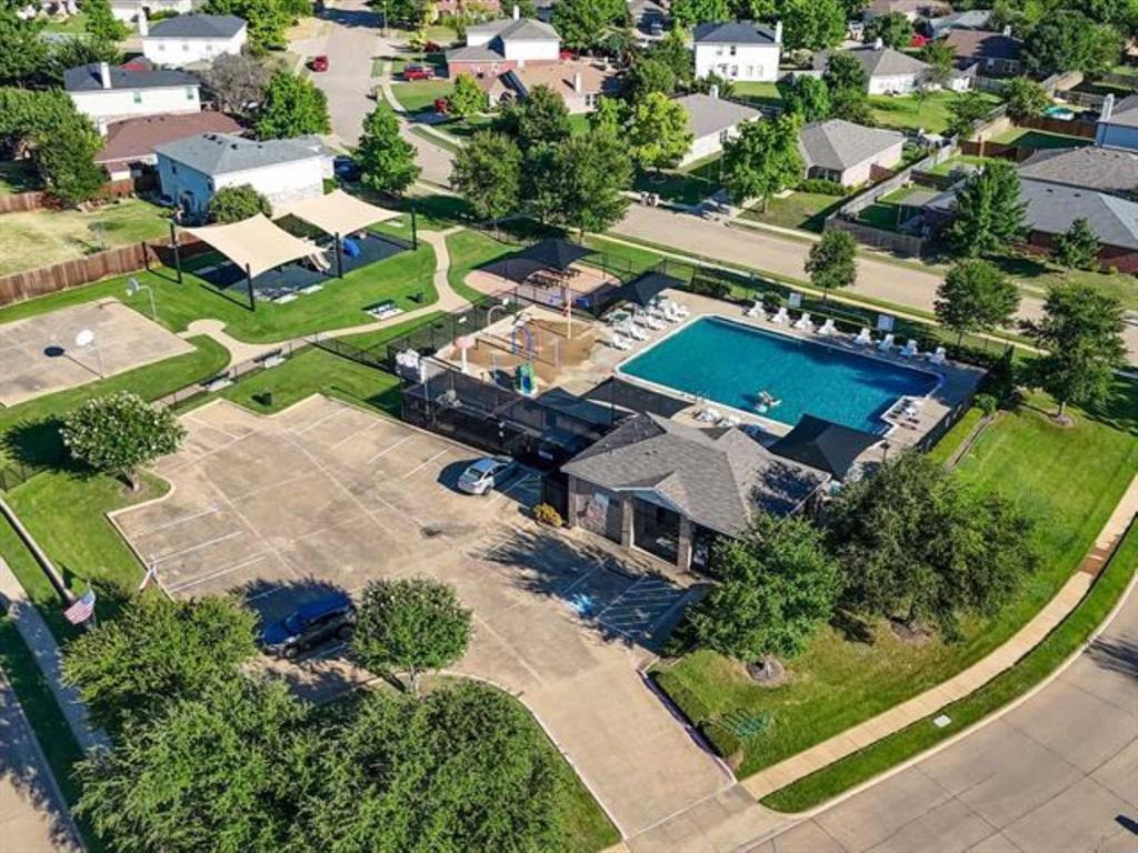 8201 Canoe Ridge Lane Denton, TX 76210 - Photo 23 of 25 an aerial view of a house with a garden