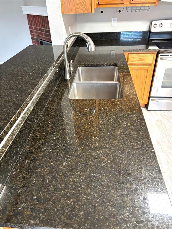 8201 Canoe Ridge Lane Denton, TX 76210 - Photo 9 of 25 a close view of sink and tap