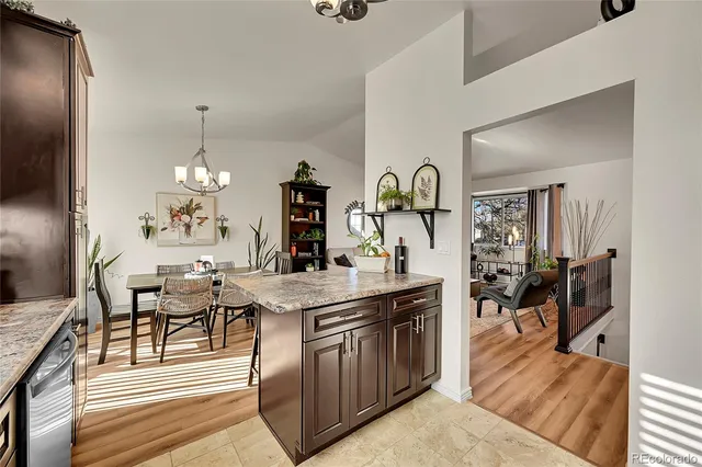 a view of a kitchen and dining room