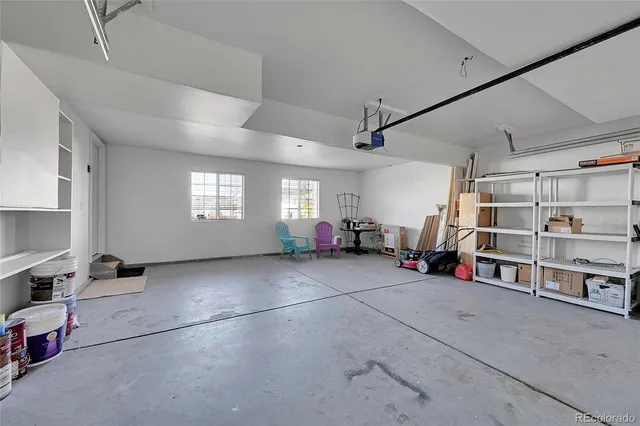 a view of a garage with furniture and window