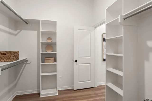 a view of an empty walk in closet