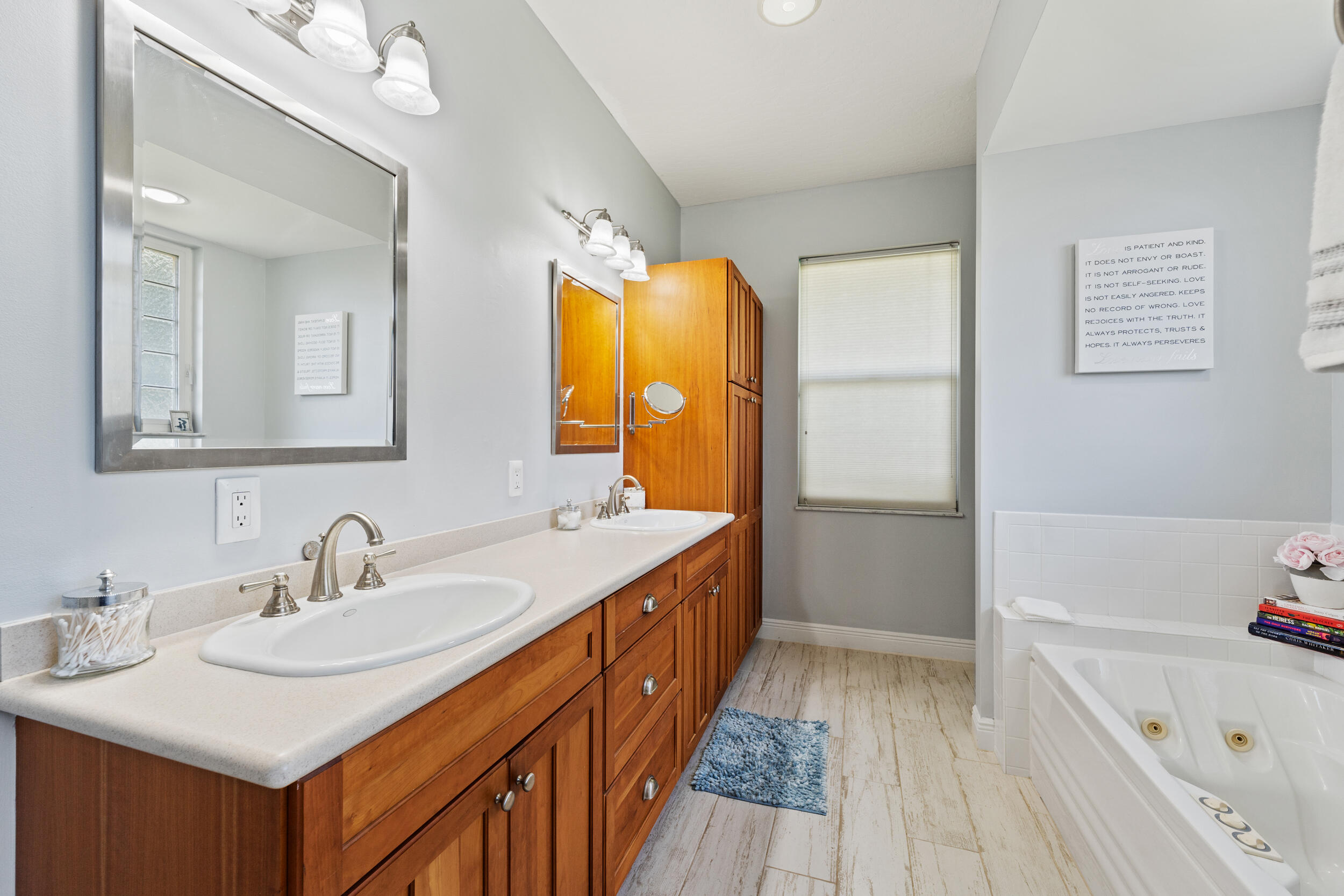 619 Fischer Hammock Road Sebastian, FL 32958 - Photo 14 of 36 a bathroom with a sink and a mirror