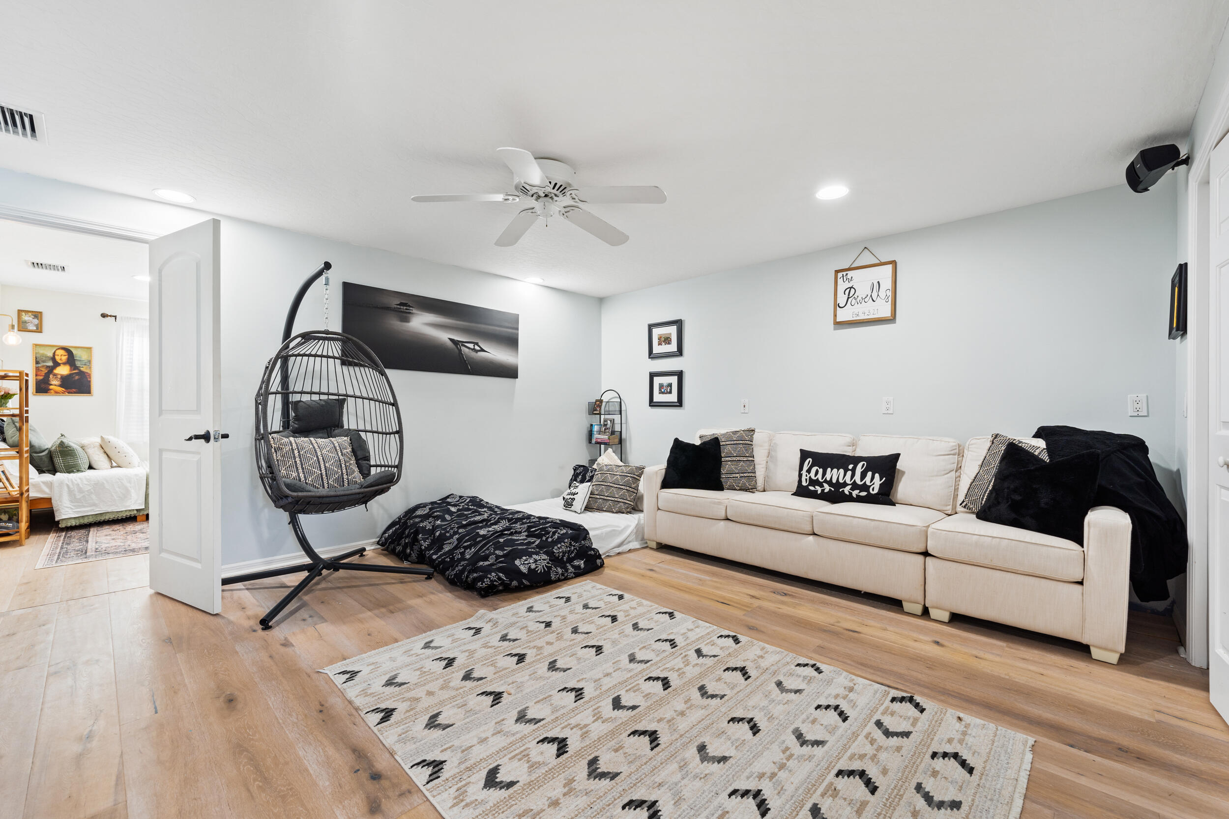 619 Fischer Hammock Road Sebastian, FL 32958 - Photo 25 of 36 a living room with furniture a rug and wooden floor