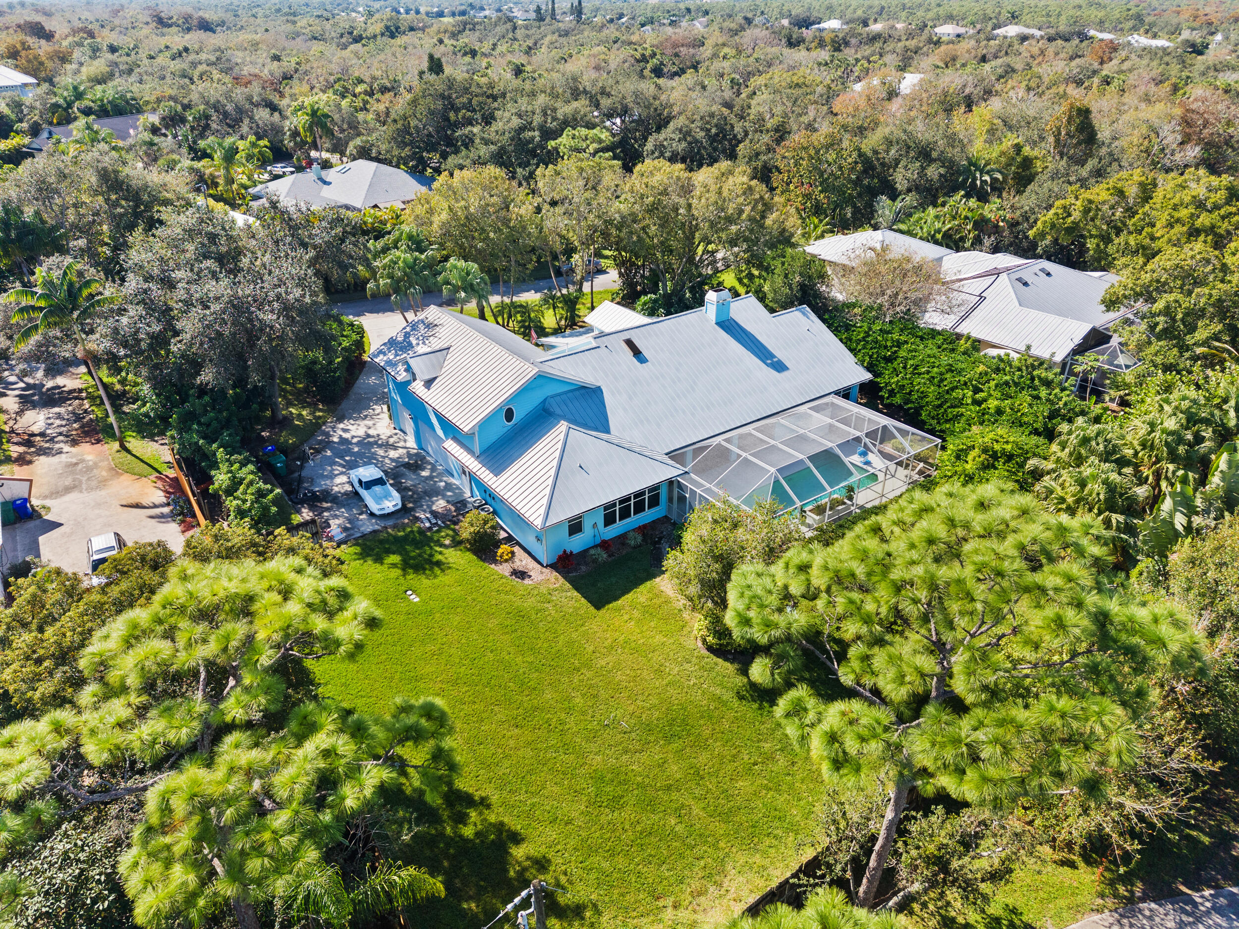 619 Fischer Hammock Road Sebastian, FL 32958 - Photo 29 of 36 an aerial view of residential house with swimming pool and outdoor space