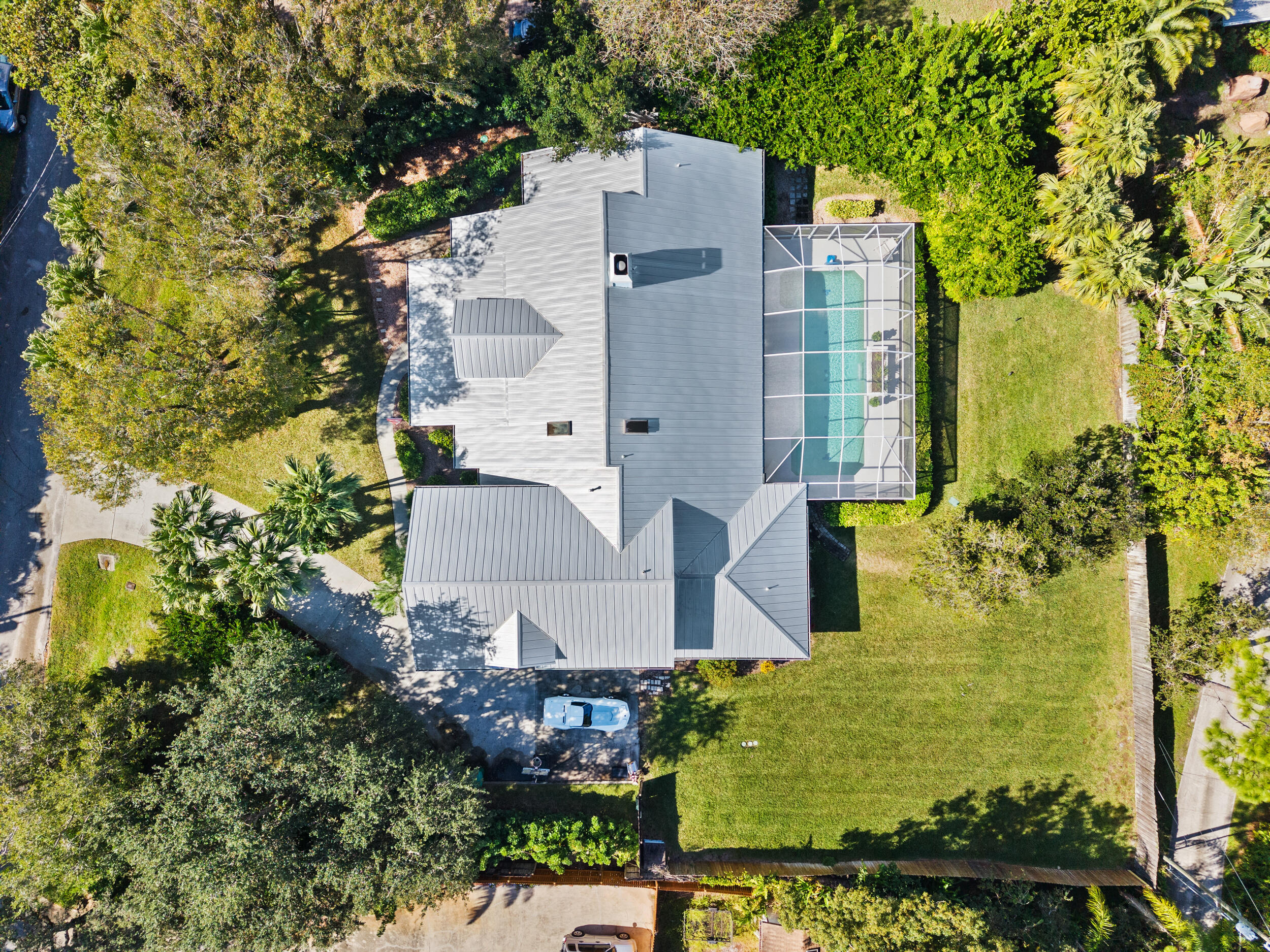 619 Fischer Hammock Road Sebastian, FL 32958 - Photo 30 of 36 an aerial view of residential houses with outdoor space