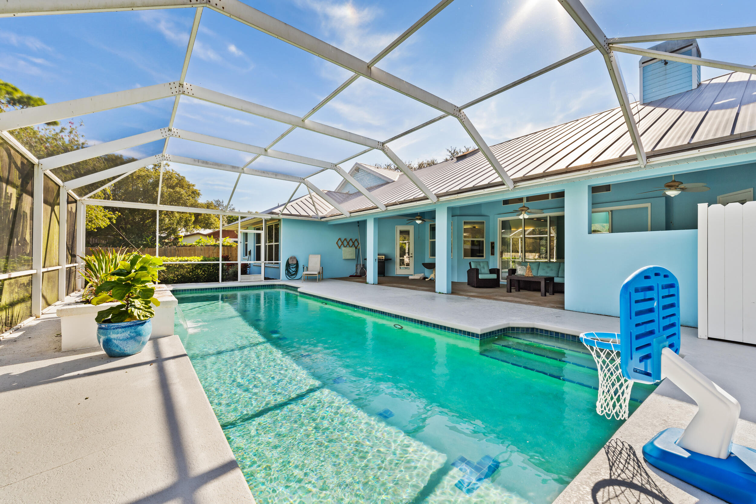 619 Fischer Hammock Road Sebastian, FL 32958 - Photo 3 of 36 a view of a porch with furniture