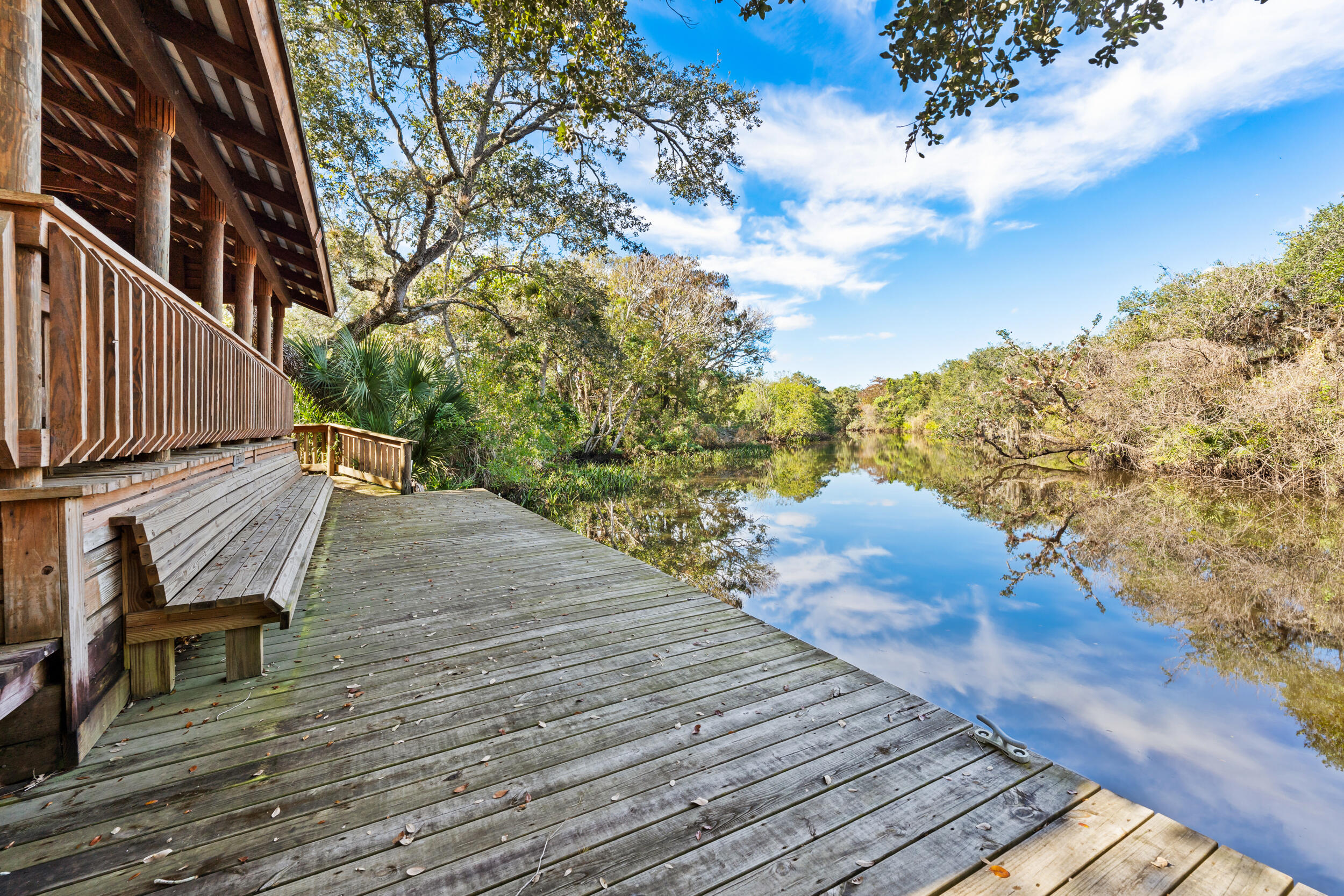 619 Fischer Hammock Road Sebastian, FL 32958 - Photo 33 of 36 a view of a backyard with sitting area