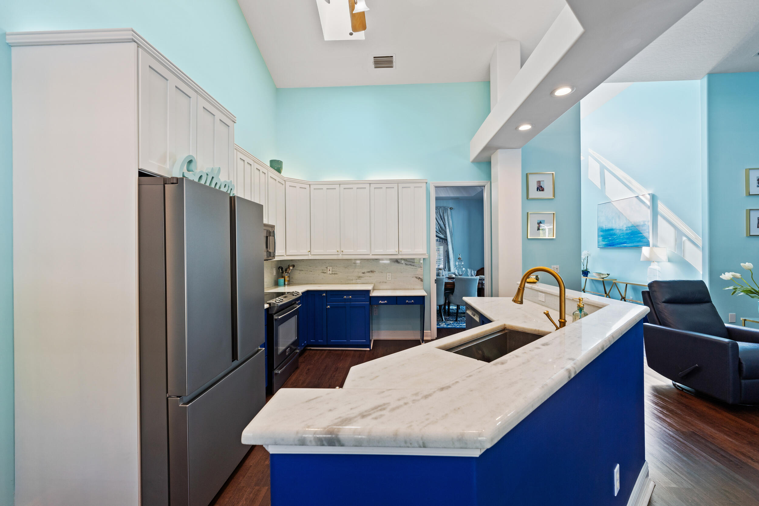 619 Fischer Hammock Road Sebastian, FL 32958 - Photo 6 of 36 a kitchen with refrigerator and cabinets