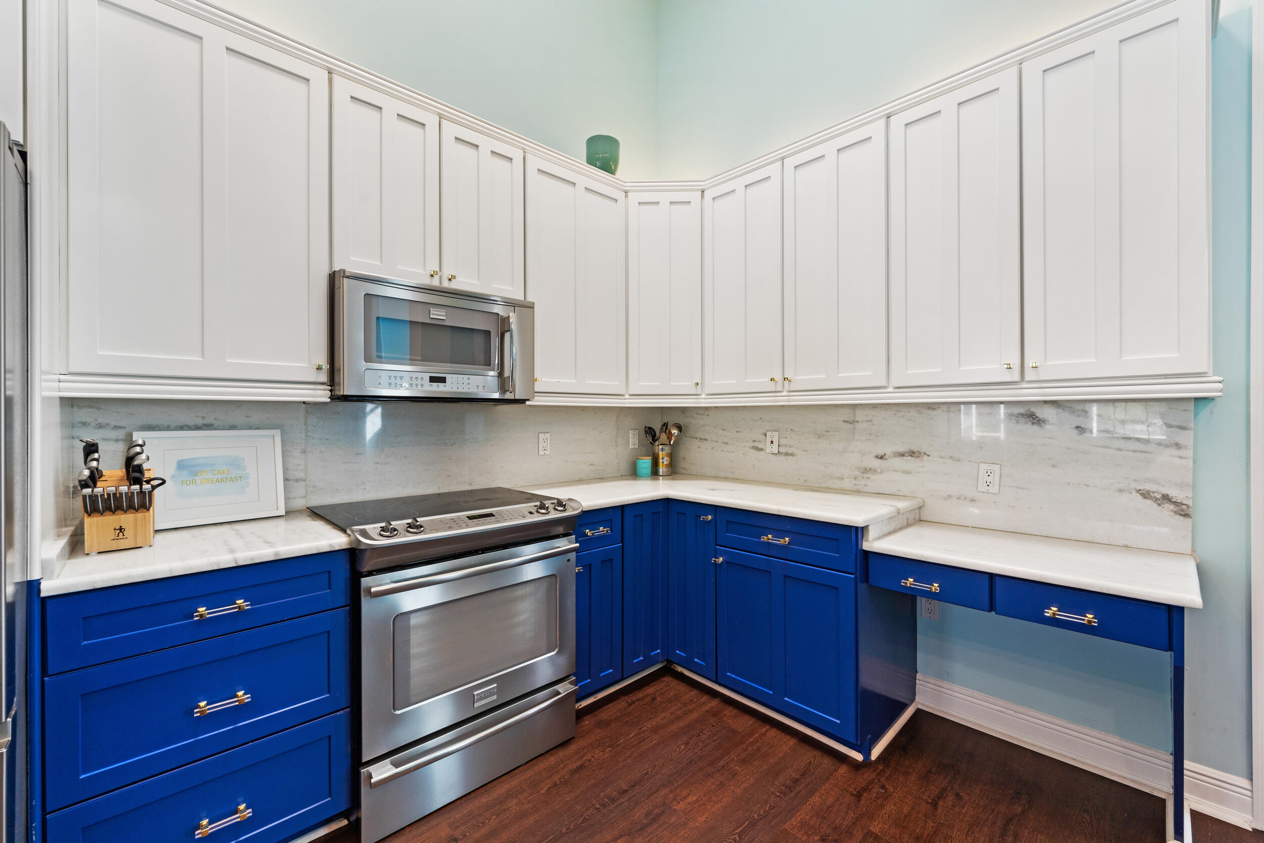 619 Fischer Hammock Road Sebastian, FL 32958 - Photo 8 of 36 a kitchen with granite countertop wooden cabinets and a stove