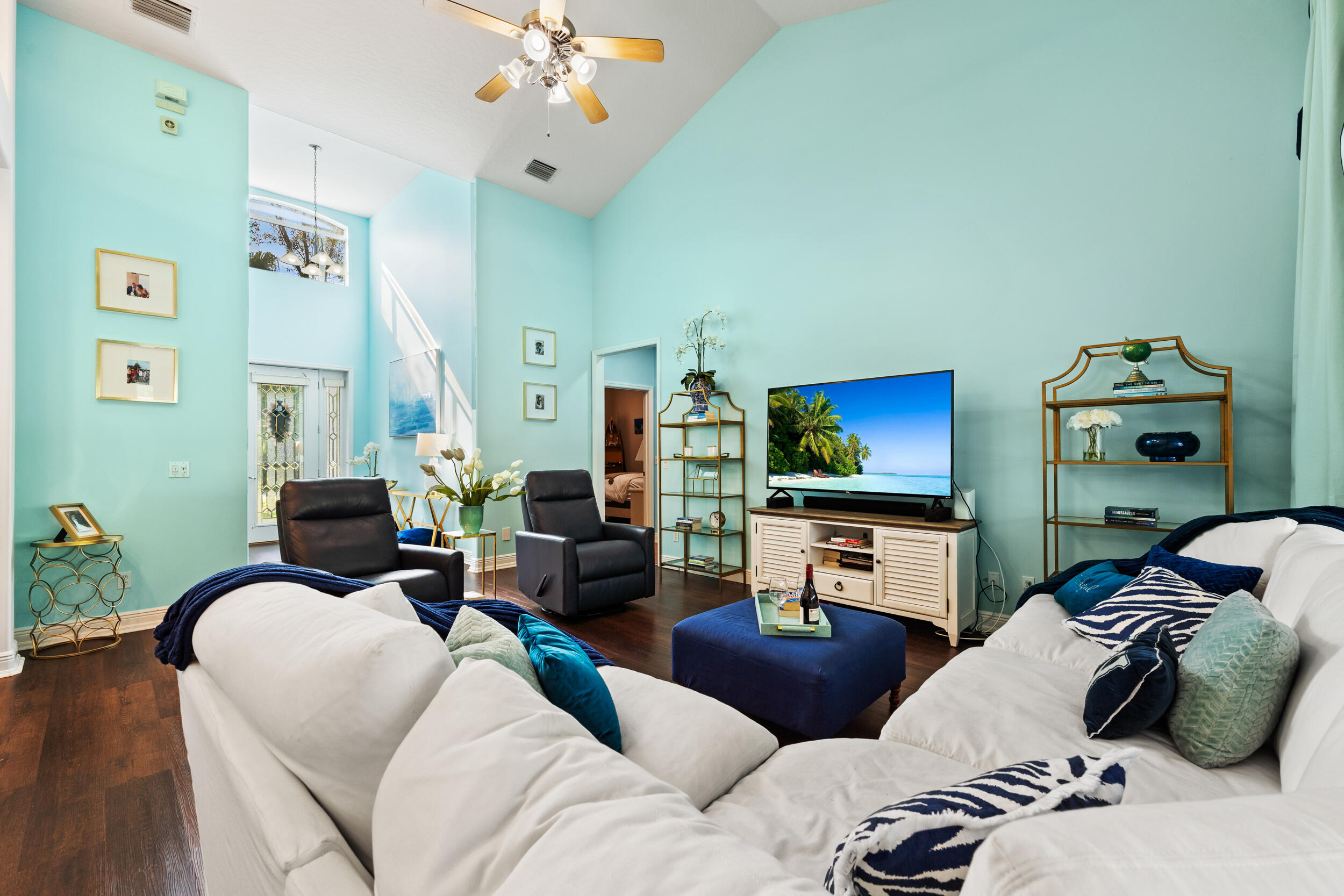 619 Fischer Hammock Road Sebastian, FL 32958 - Photo 10 of 36 a living room with furniture and a flat screen tv