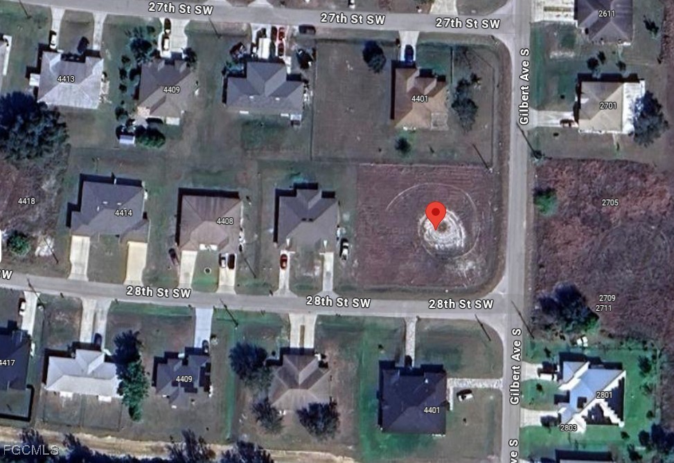 4400-4402 St Lehi 28th Street Southwest Lehigh Acres, FL 33973 - Photo 4 of 5 an aerial view of waterside residential