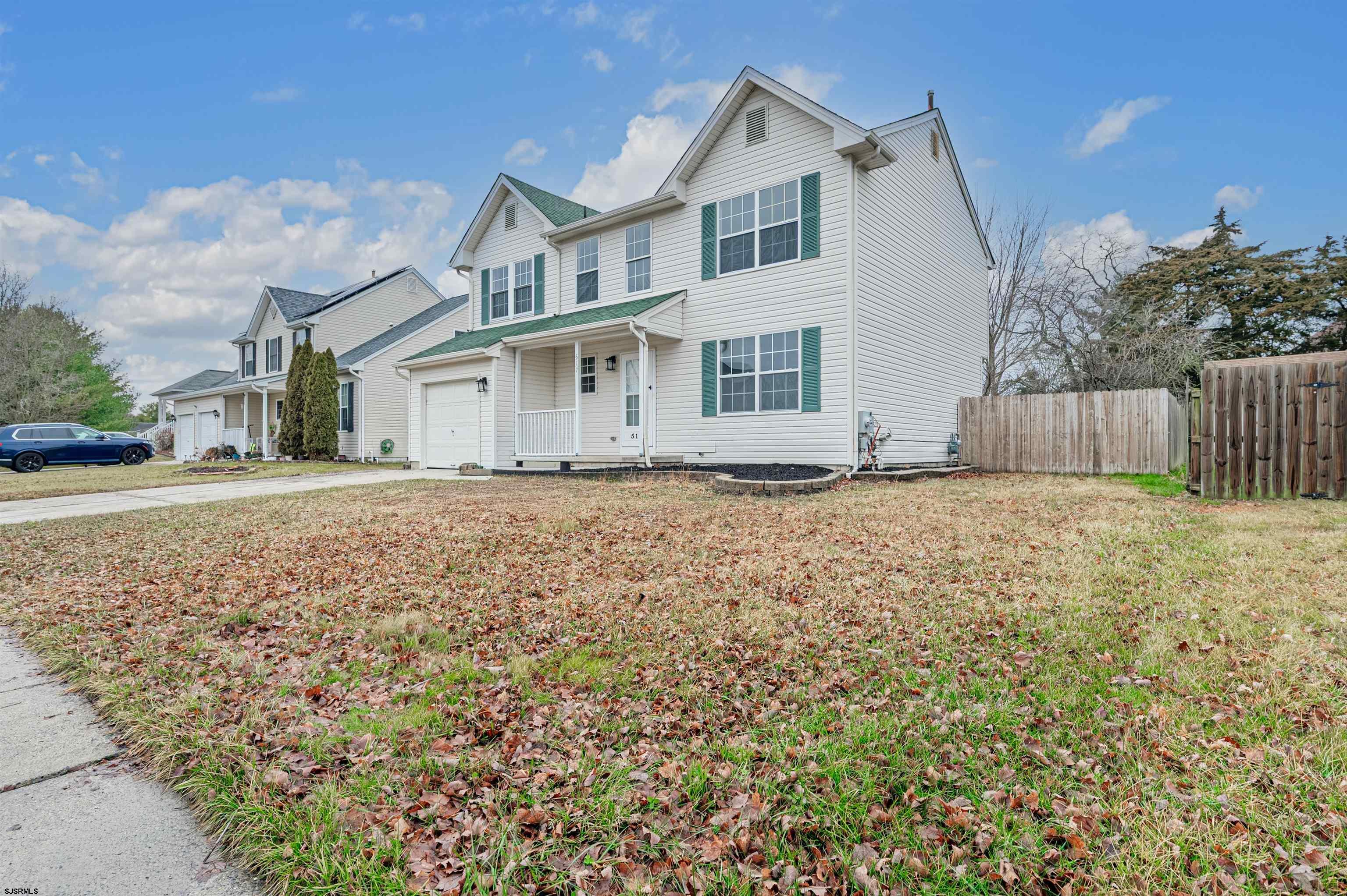 517 Superior Road Egg Harbor Township, NJ 08234 - Photo 4 of 35 front view of a house with a yard