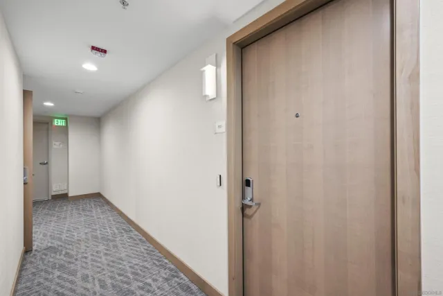 a kitchen with stainless steel appliances a stove a sink dishwasher a microwave oven and cabinets