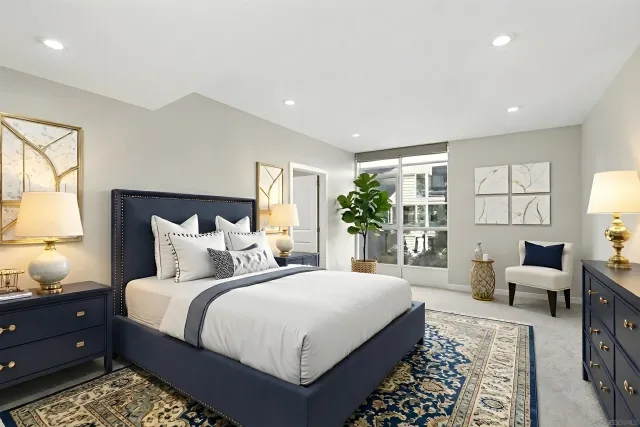 a view of a room with large windows and a bathroom