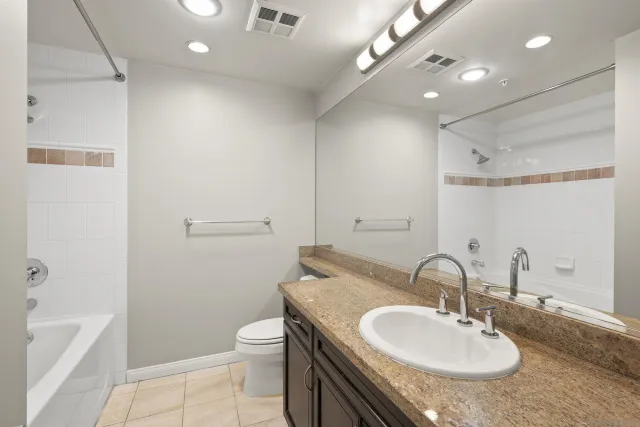 a view of a storage & utility room with a washer and dryer