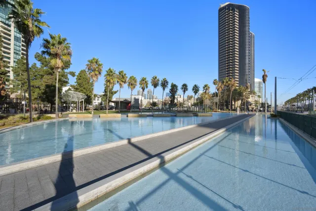 a view of a swimming pool with chairs