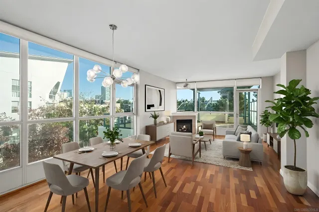 a view of a kitchen with cabinets and wooden floor