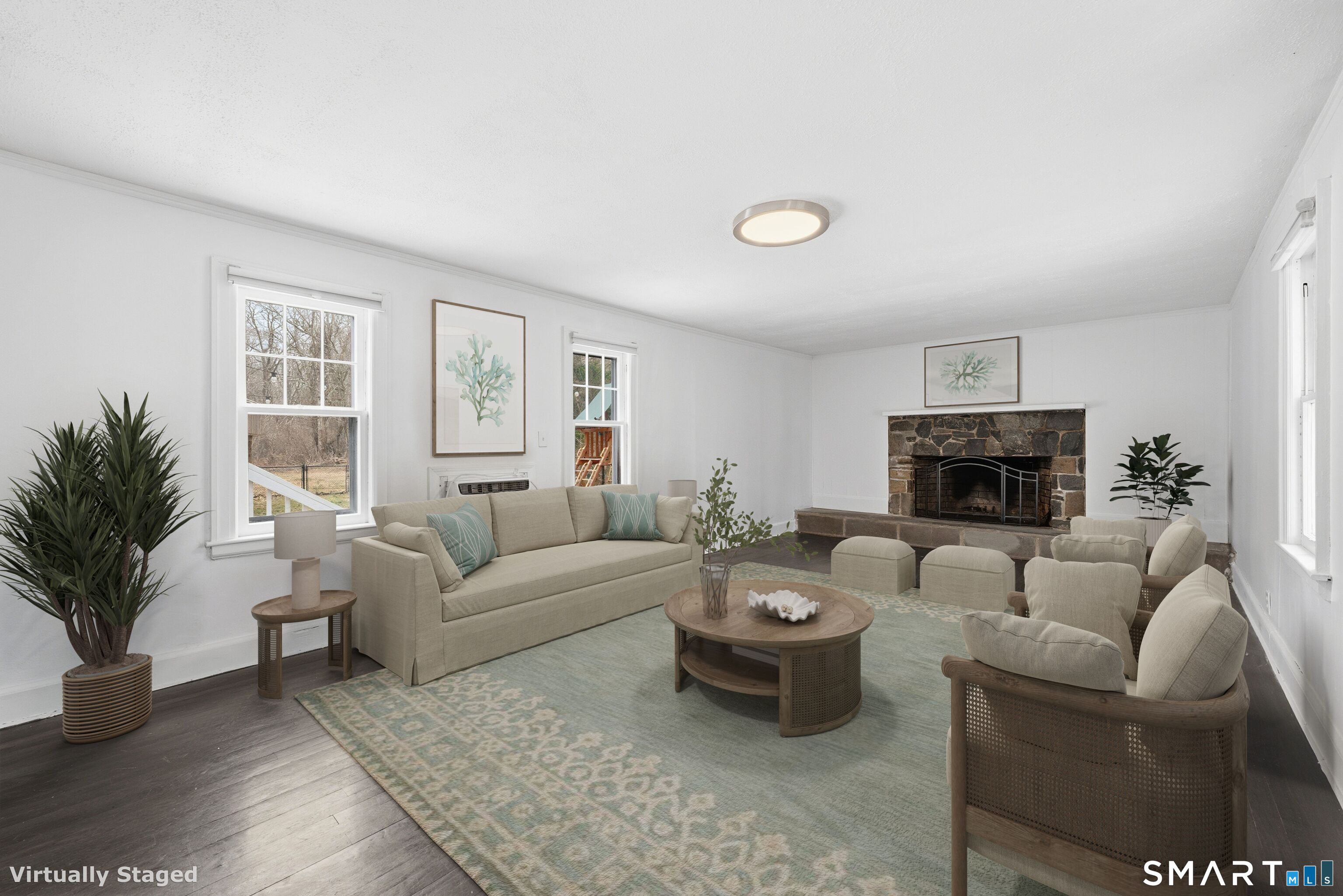 660 Opening Hill Road Madison, CT 06443 - Photo 15 of 36 a living room with furniture and a fireplace