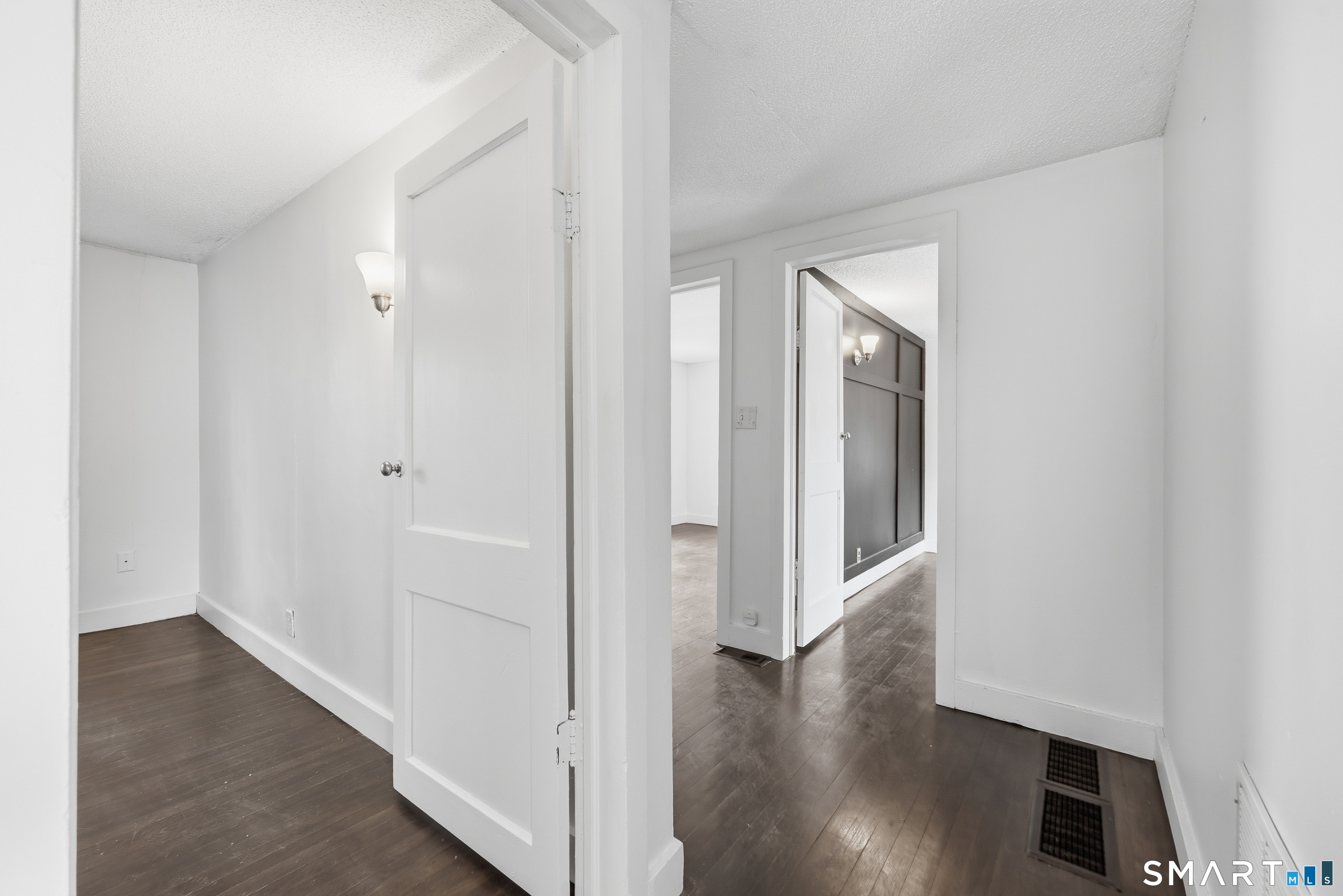 660 Opening Hill Road Madison, CT 06443 - Photo 19 of 36 a view of a hallway with wooden floor