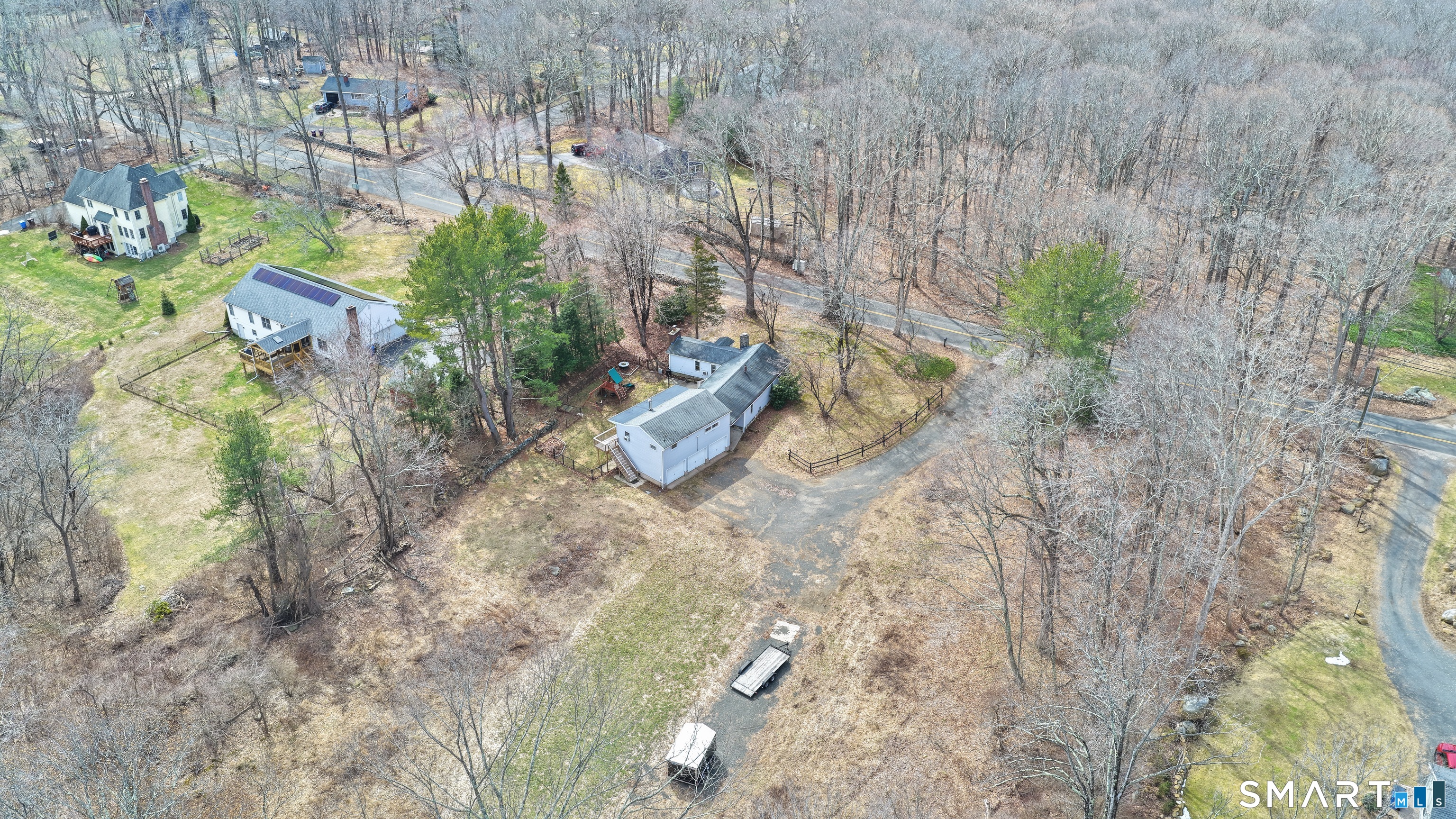 660 Opening Hill Road Madison, CT 06443 - Photo 3 of 36 a aerial view of a house with a yard and large tree