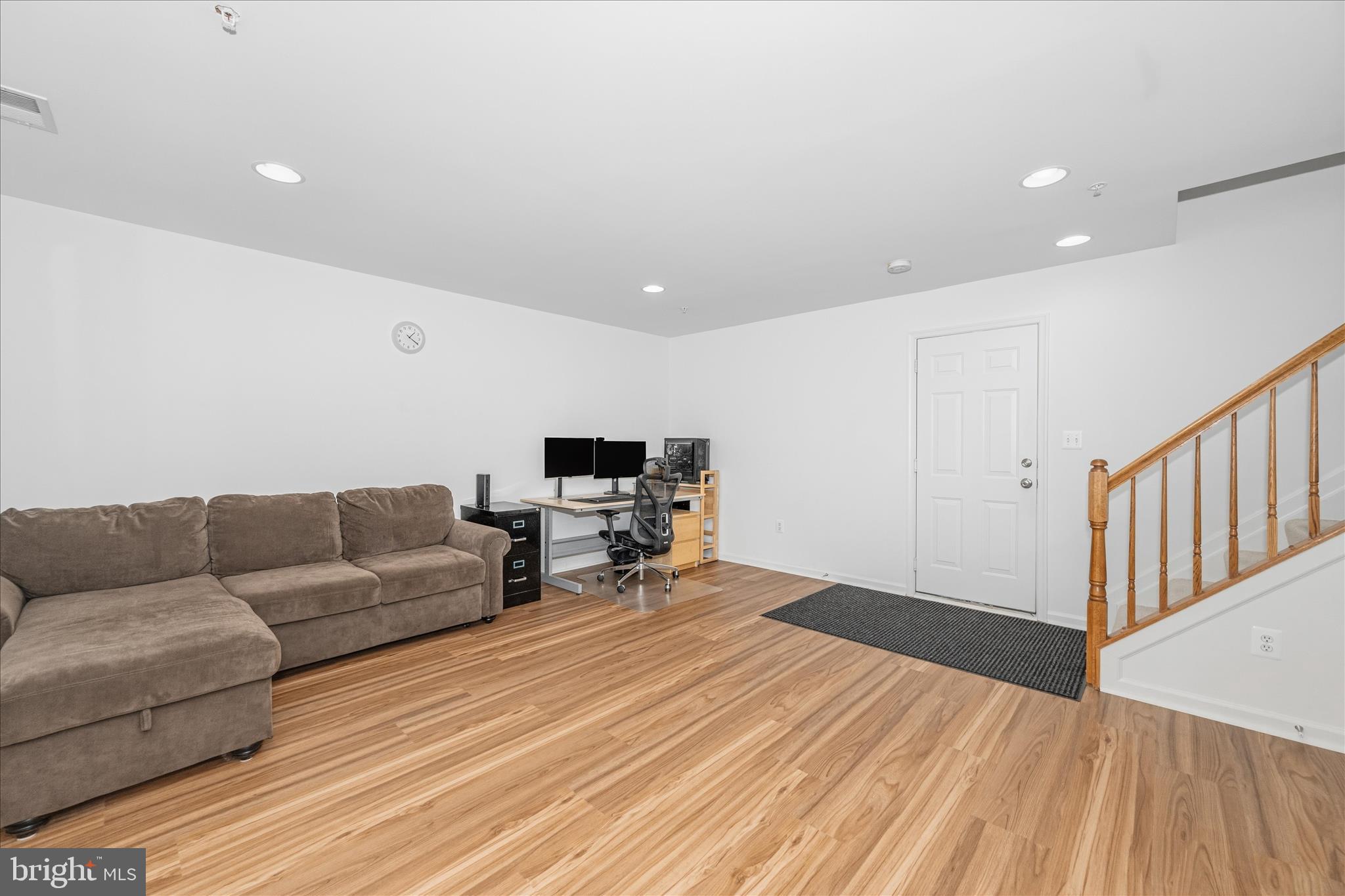 21 Inkberry Circle Gaithersburg, MD 20877 - Photo 43 of 51 a living room with furniture and a wooden floor