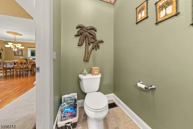 a bathroom with a toilet and a sink