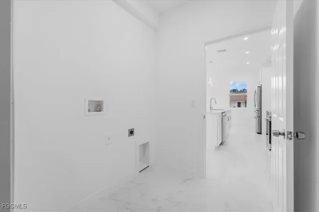 a view of a room with white walls