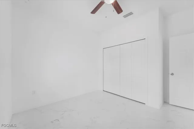 a bathroom with a sink toilet vanity and bathtub