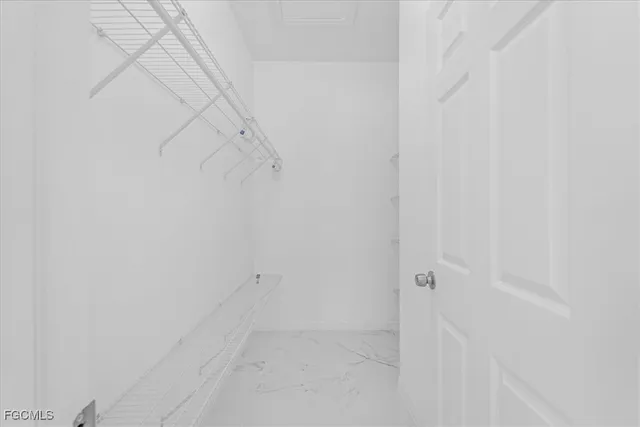 a bathroom with a granite countertop sink mirror and double