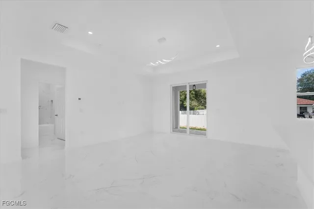 a view of a back yard of the house