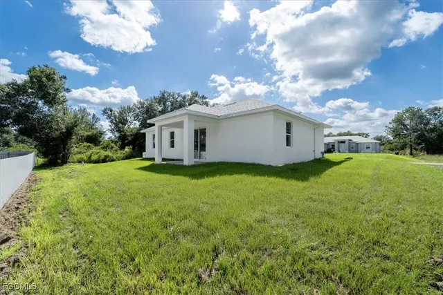 an aerial view of residential house with outdoor space