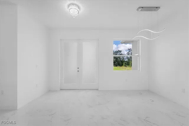 an empty room with windows