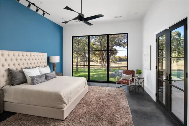 a bed room with a bed and a couch