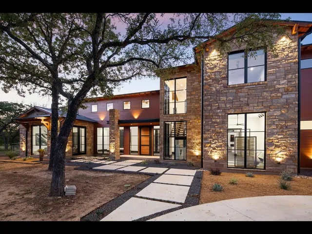 a view of a building with a tree