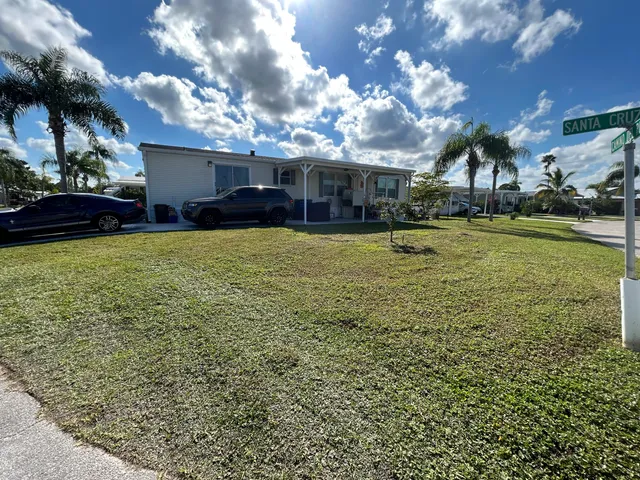 a view of a house with a big yard