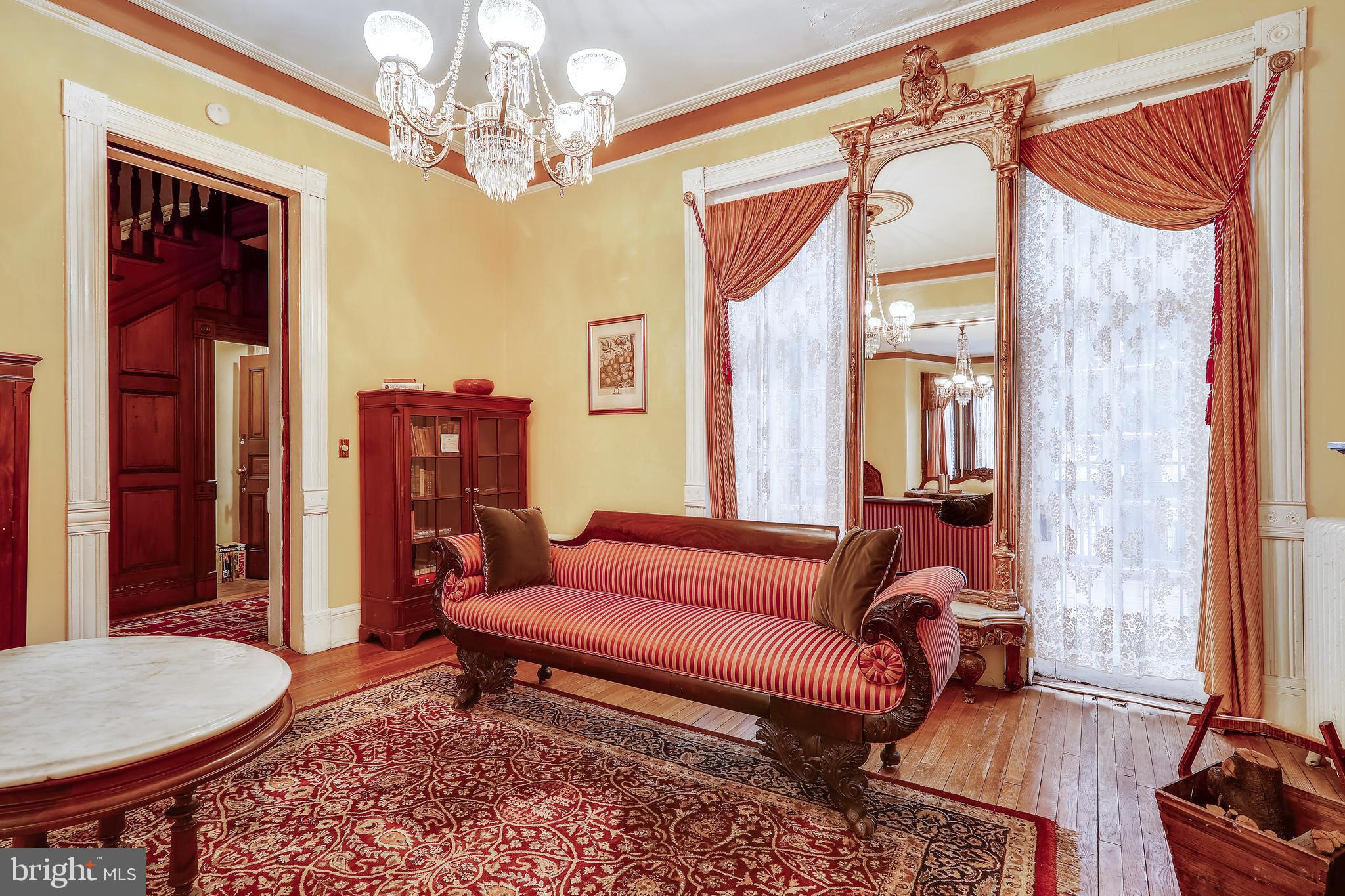 23 Logan Circle Northwest Washington, DC 20005 - Photo 4 of 59 The second parlor with windows to the rear deck.