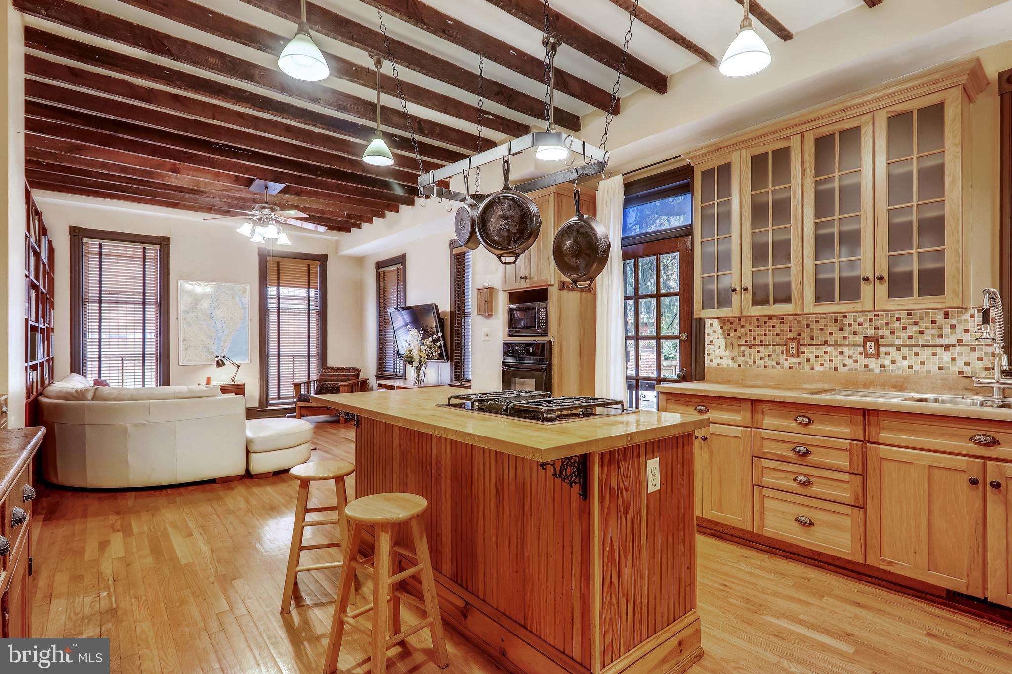 23 Logan Circle Northwest Washington, DC 20005 - Photo 8 of 59 Enormous kitchen with beamed ceiling.