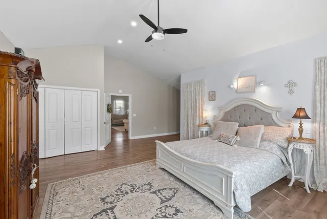 an aerial view of residential building and lake