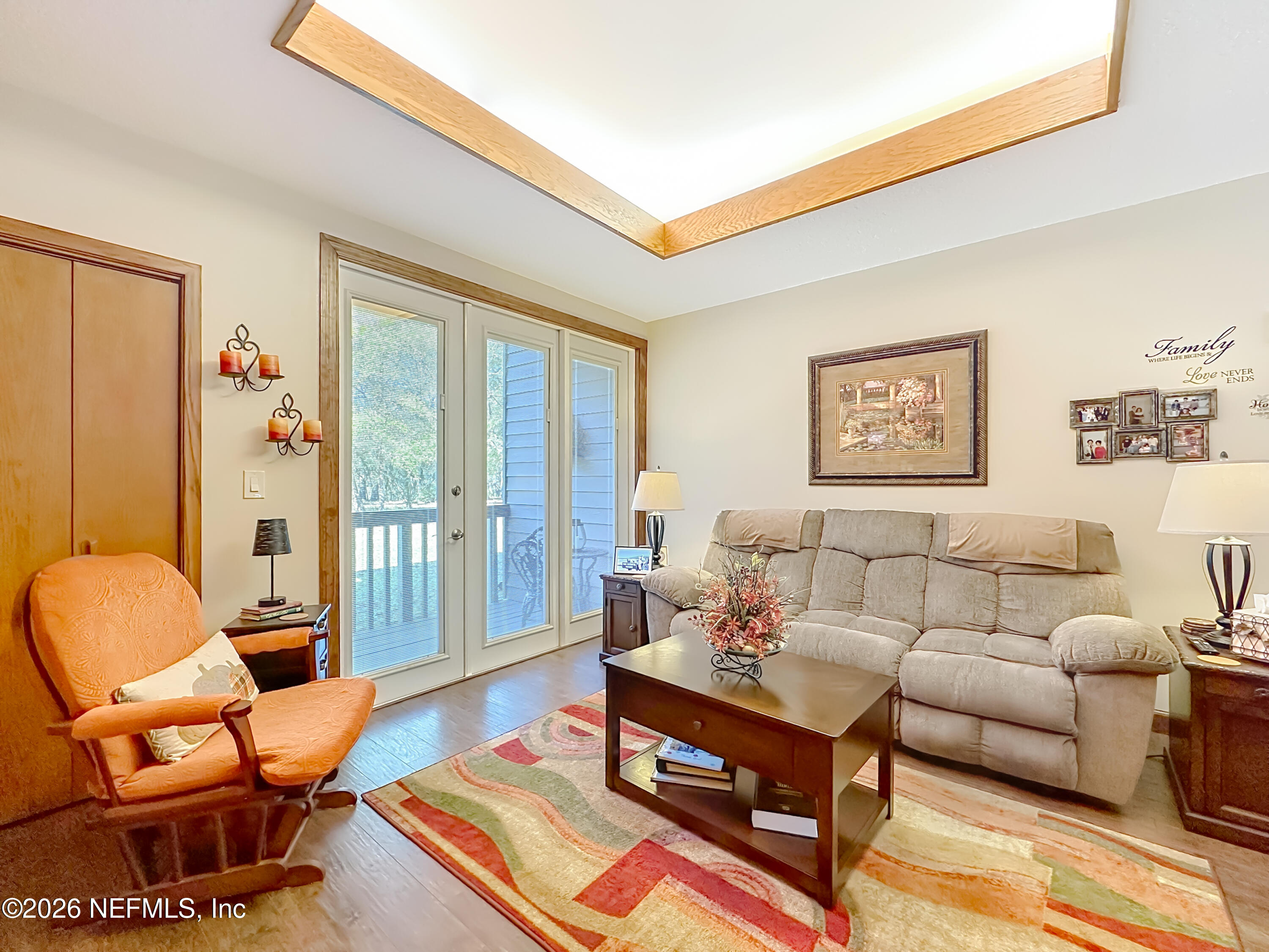2910 Ravines Road, Unit 1103 Middleburg, FL 32068 - Photo 14 of 36 a living room with furniture and a window