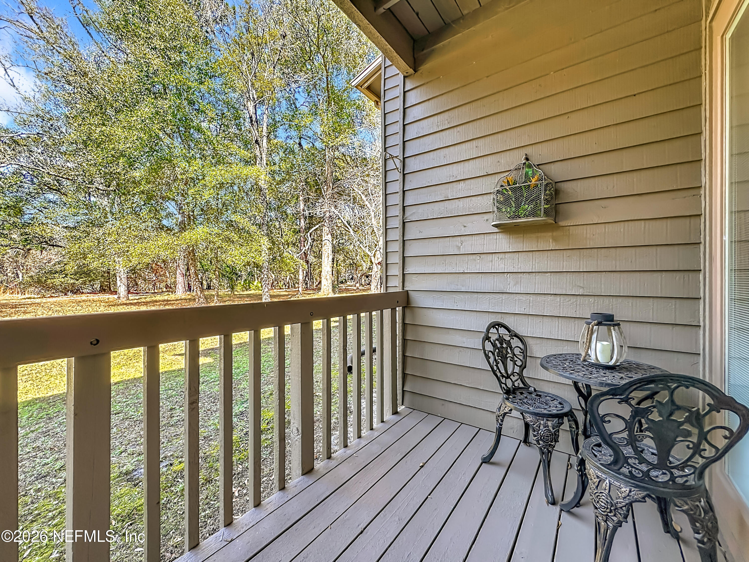 2910 Ravines Road, Unit 1103 Middleburg, FL 32068 - Photo 33 of 36 a view of a chairs on the deck