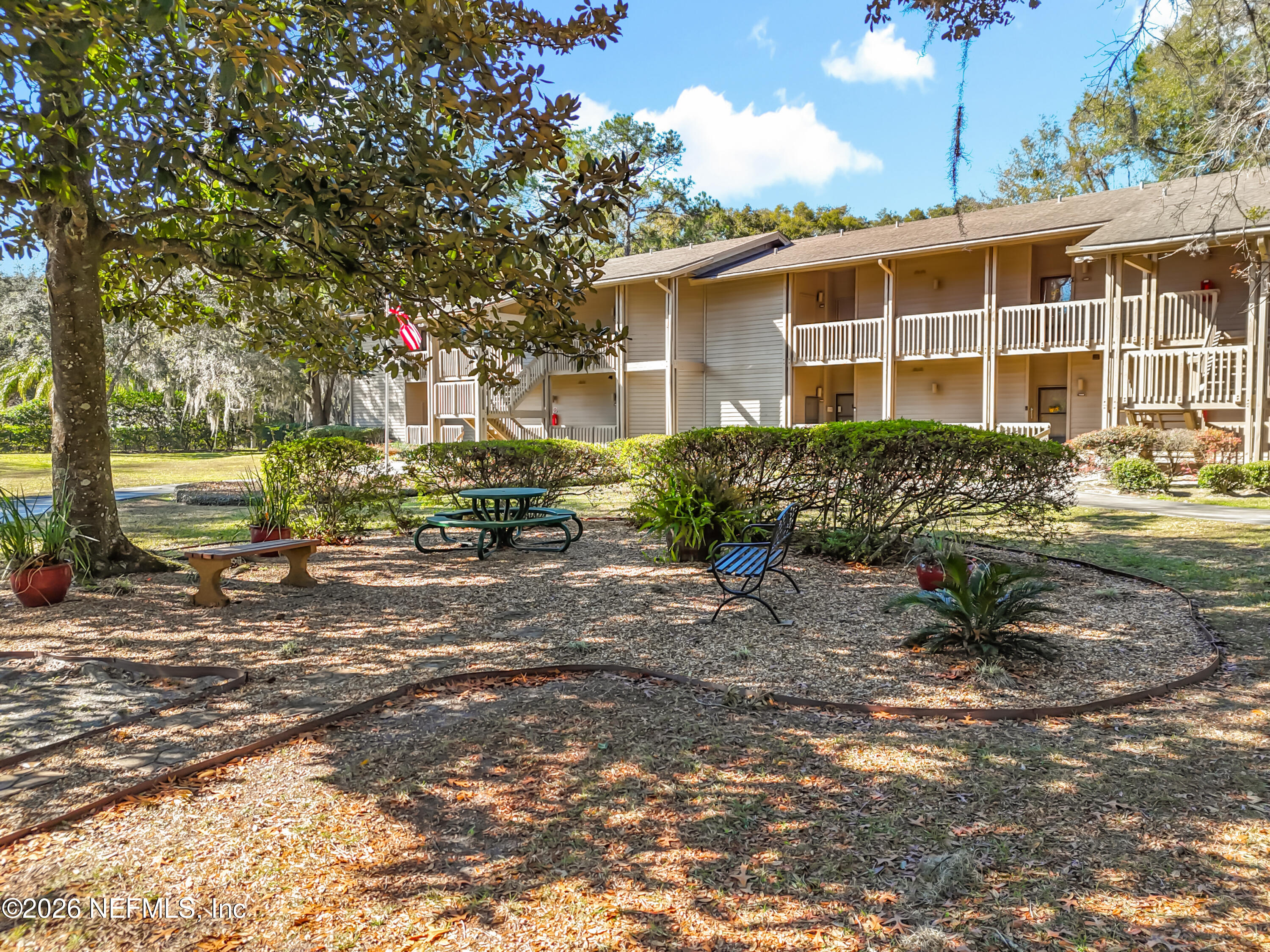2910 Ravines Road, Unit 1103 Middleburg, FL 32068 - Photo 4 of 36 a view of a house with a garden