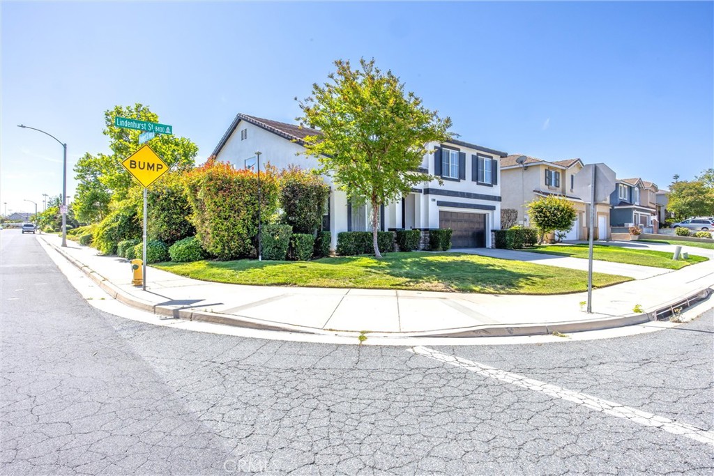 8402 Lindenhurst Street Riverside, CA 92508 - Photo 47 of 60 a view of a house with a big yard and potted plants