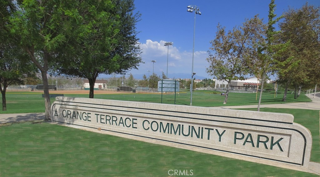 8402 Lindenhurst Street Riverside, CA 92508 - Photo 57 of 60 a view of a park with sign board and garden