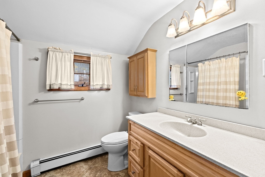 31 Doris Road Braintree, MA 02184 - Photo 17 of 20 a bathroom with a sink and a toilet