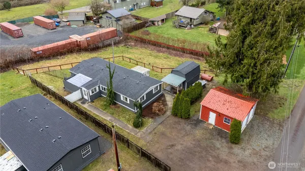 an aerial view of a house with a garden