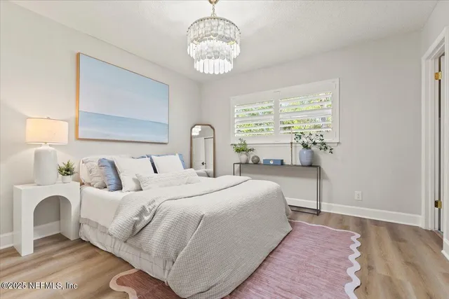 a bathroom with a sink mirror vanity and toilet