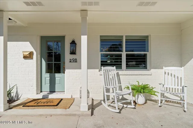 a view of chair and table in the patio